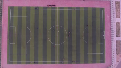Aerial-drone-shot-of-football-field-in-Mongolia-Ulanbator